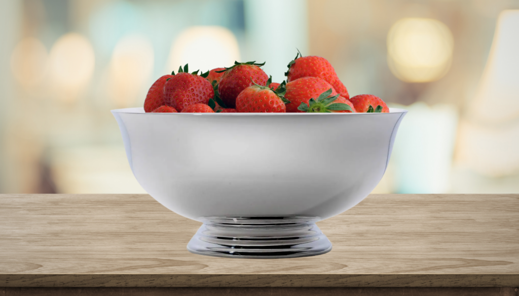 Silver Paul Revere Bowl full of Strawberries