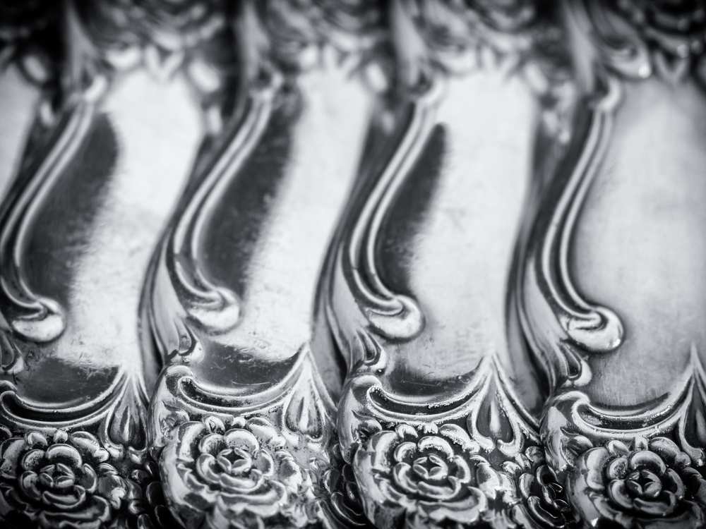 floral handles on flatware lined up together