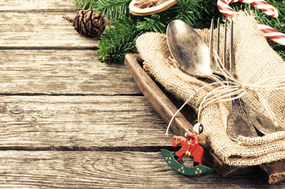 flatware on burlap ontop of wood table