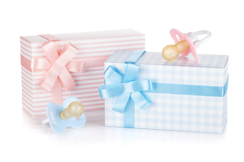 blue and pink presents with matching pacifiers