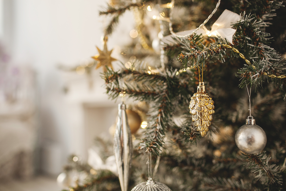 Gold and silver Ornaments on a frosted tree