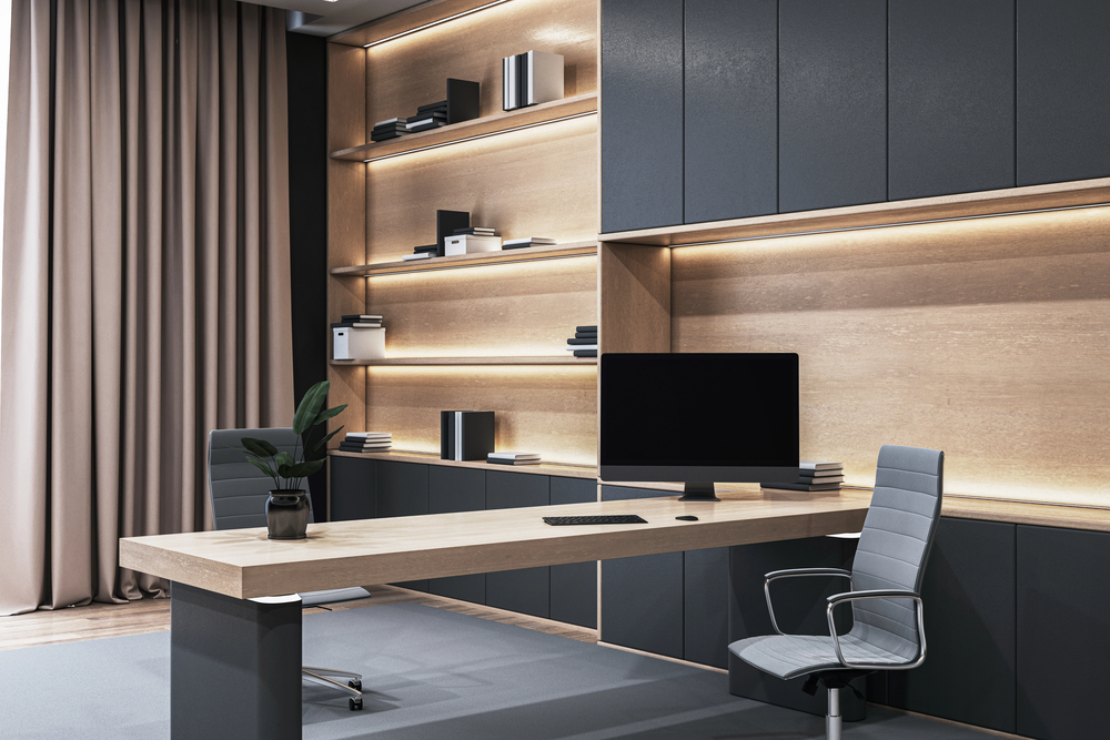 Wood desk with dark cabinets and nice lighting