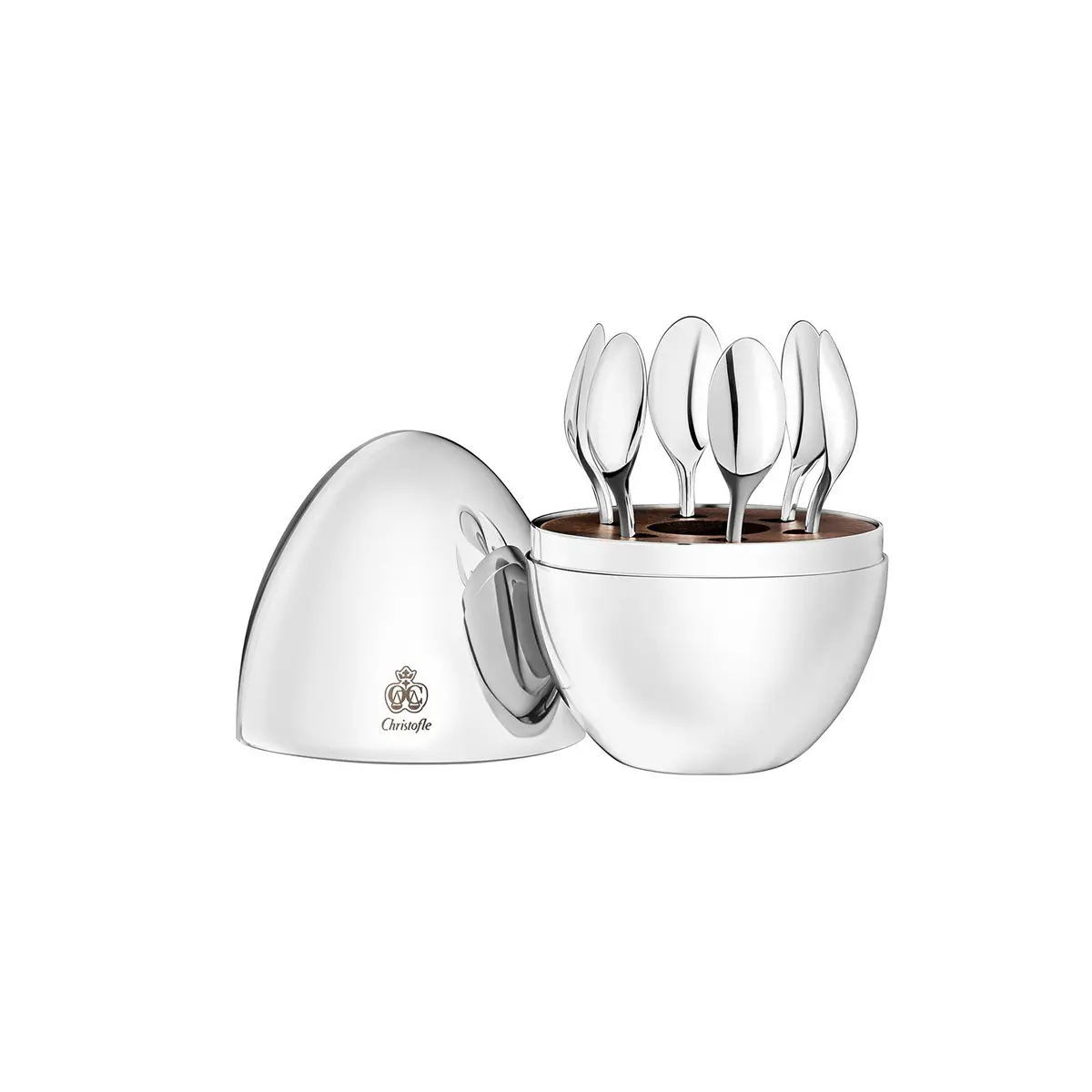 silver plate egg capsule with silverplate coffee spoons in it