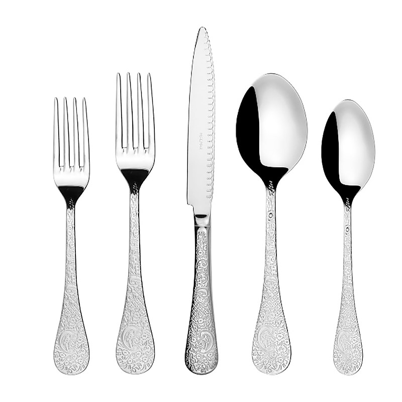 ornate flatware set with elegant scroll work