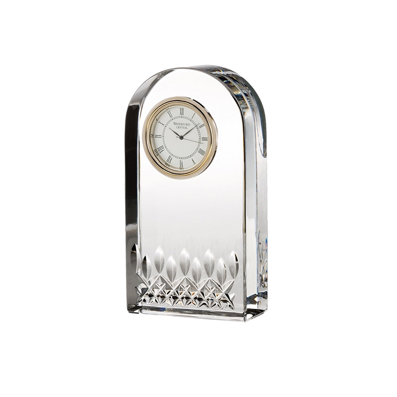 Crystal and gold trim clock with lismore style cuts in it