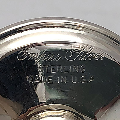 Sterling Silver Stamped on a Baby Rattle