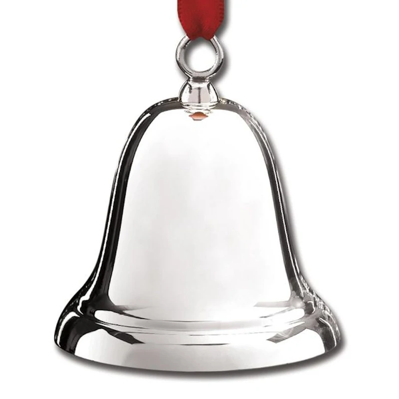 Plain and elegant silver bell hanging on red ribbon